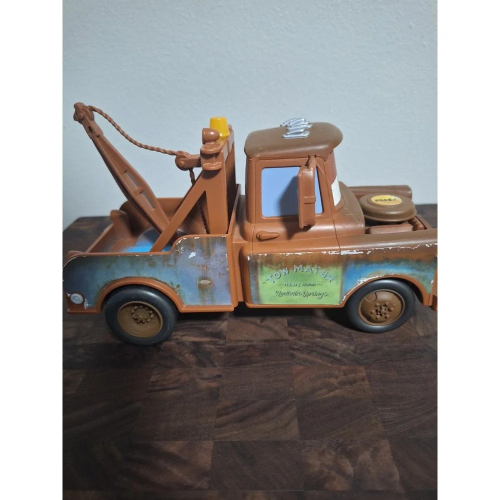 Disney Pixar Cars Light Up Tow Mater Tow Truck Engine Press Sound Toy